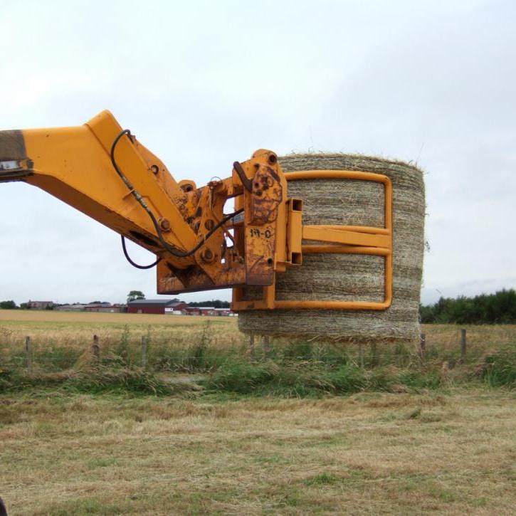 Wrapped Bale Clamp for handing wrapped silage bales.